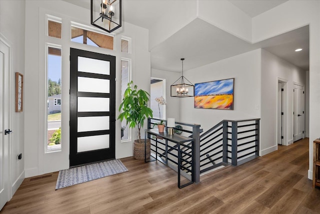 5212 W Decatur Ave, Spokane, WA 99208 - entryway with a chandelier, healthy amount of natural light, wood finished floors, baseboards, and recessed lighting