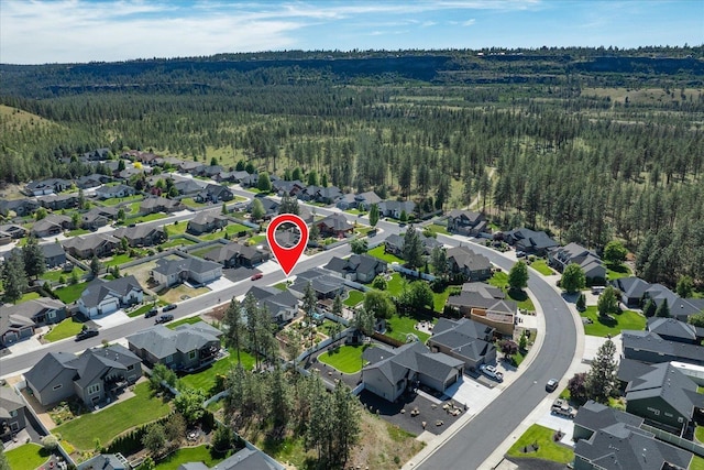 5212 W Decatur Ave, Spokane, WA 99208 - aerial view of property's location featuring a forest and nearby suburban area