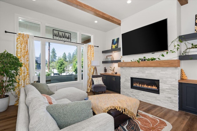 5212 W Decatur Ave, Spokane, WA 99208 - living area with wood finished floors, beam ceiling, a stone fireplace, and recessed lighting