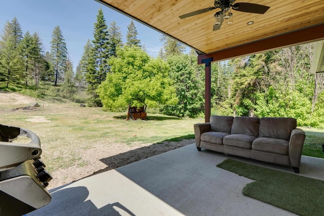 33319 N Conklin Rd, Elk, WA 99009 - view of patio featuring ceiling fan, an outdoor living space, and view of scattered trees