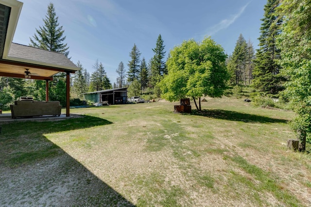 33319 N Conklin Rd, Elk, WA 99009 - view of grassy yard featuring a ceiling fan