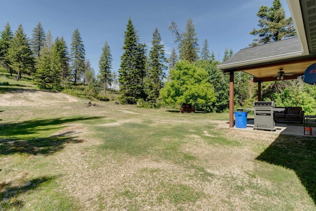 33319 N Conklin Rd, Elk, WA 99009 - view of green lawn with a ceiling fan and a patio