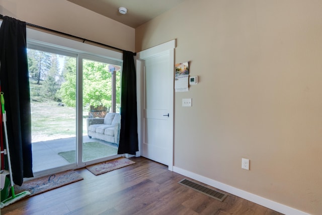 33319 N Conklin Rd, Elk, WA 99009 - empty room featuring wood finished floors, baseboards, and a smoke detector