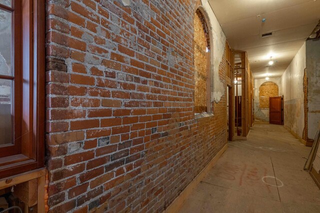 2225 S Inland Empire Way, Spokane, WA 99224 - hallway featuring brick wall