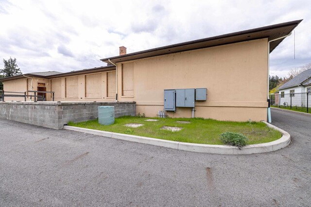 2225 S Inland Empire Way, Spokane, WA 99224 - view of property exterior with a chimney