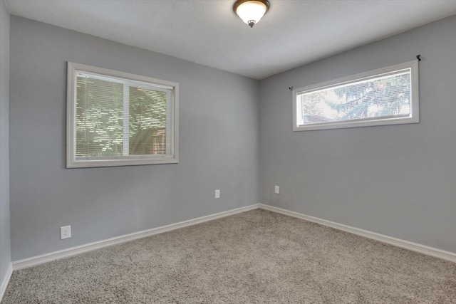 436 N Washington St, Tekoa, WA 99033 - unfurnished room featuring carpet flooring and baseboards