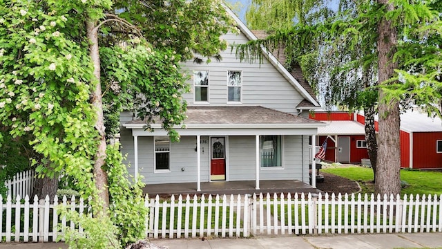 436 N Washington St, Tekoa, WA 99033 - view of front of house featuring a porch and roof with shingles
