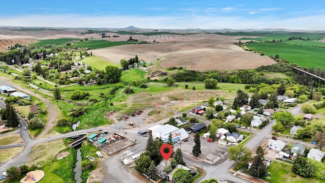 436 N Washington St, Tekoa, WA 99033 - aerial overview of property's location featuring mountains