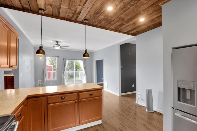 436 N Washington St, Tekoa, WA 99033 - kitchen with stainless steel appliances, wood ceiling, light countertops, a ceiling fan, and light wood-type flooring
