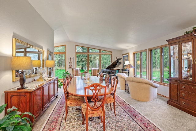 5999 E Roger Dr, Post Falls, ID 83854 - dining area featuring healthy amount of natural light, vaulted ceiling, and carpet flooring