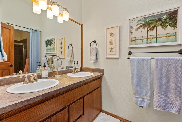 5999 E Roger Dr, Post Falls, ID 83854 - full bath with double vanity and an enclosed shower