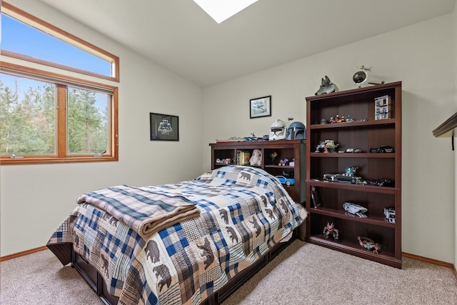 5999 E Roger Dr, Post Falls, ID 83854 - bedroom featuring carpet, baseboards, and vaulted ceiling