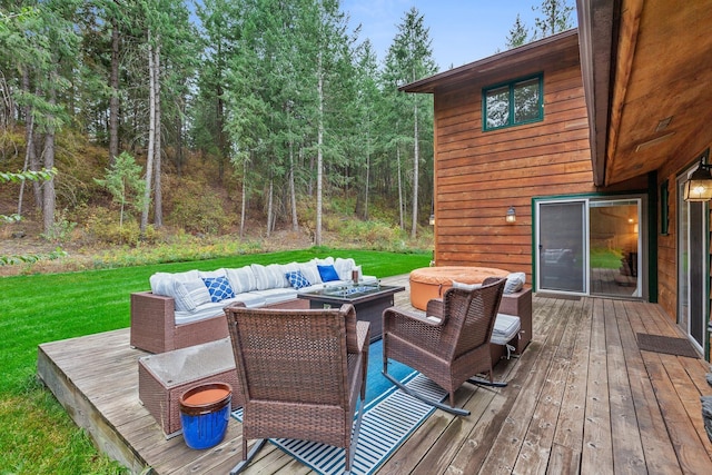 5999 E Roger Dr, Post Falls, ID 83854 - deck featuring an outdoor hangout area and a lawn