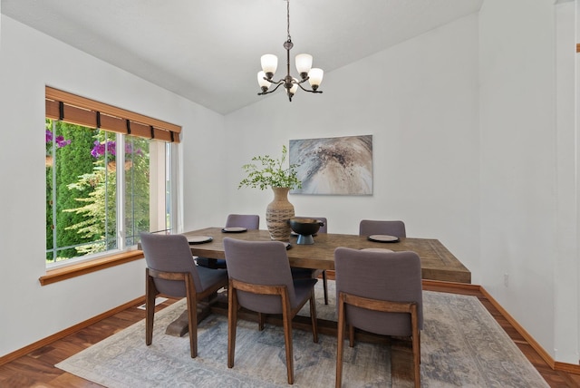 13013 E 37th Ct, Spokane Valley, WA 99206 - dining area with a chandelier, lofted ceiling, baseboards, and wood finished floors