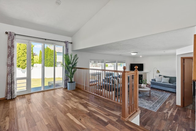 13013 E 37th Ct, Spokane Valley, WA 99206 - unfurnished room featuring wood finished floors and high vaulted ceiling