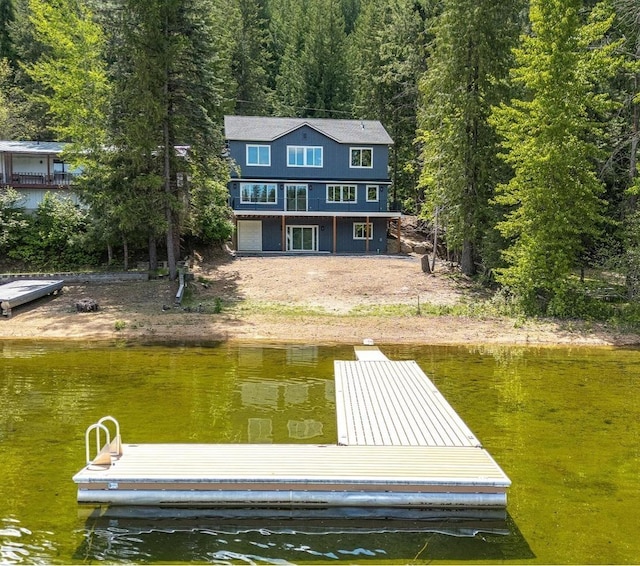 4107 Tamarack Beach Rd, Loon Lake, WA 99148 - dock with a water view and a wooded view