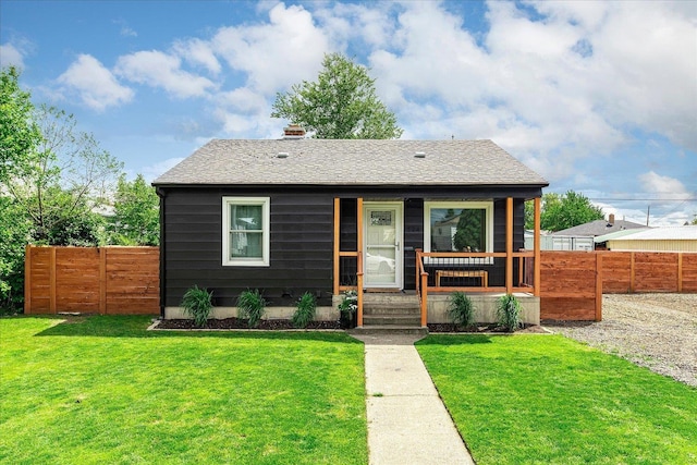 524 E Garland Ave, Spokane, WA 99207 - bungalow-style house with a chimney, covered porch, and a shingled roof
