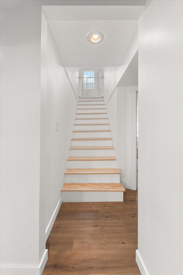 524 E Garland Ave, Spokane, WA 99207 - staircase featuring wood finished floors and baseboards