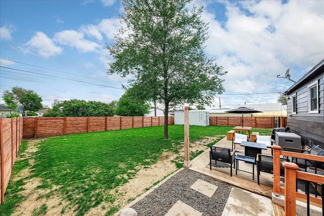 524 E Garland Ave, Spokane, WA 99207 - view of yard with an outdoor living space and a patio