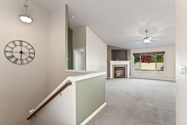 1790 N Winchester St, Liberty Lake, WA 99019 - corridor with carpet floors, an upstairs landing, baseboards, and vaulted ceiling