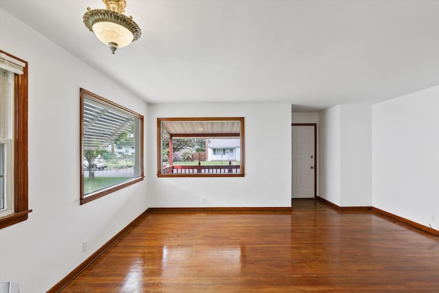 5824 N Washington St, Spokane, WA 99205 - unfurnished room featuring wood finished floors and baseboards
