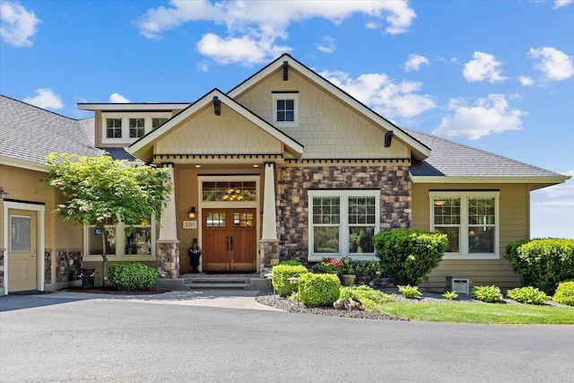3311 E Chisholm Ln, Spokane, WA 99223 - craftsman house featuring stone siding and a shingled roof