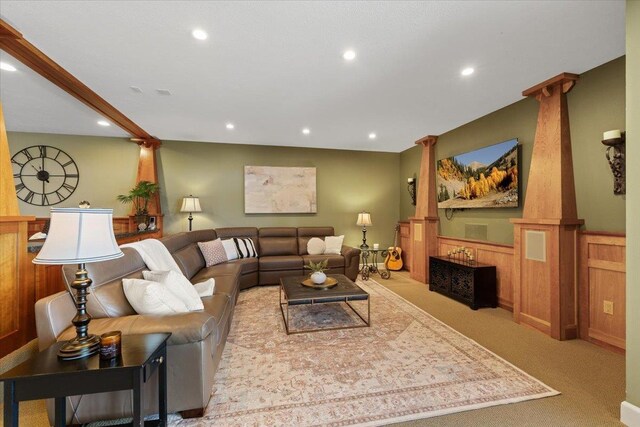 3311 E Chisholm Ln, Spokane, WA 99223 - living room with decorative columns, a wainscoted wall, recessed lighting, and light colored carpet