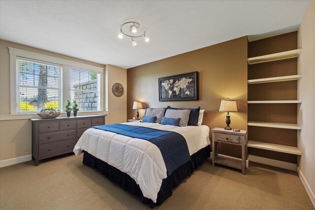 3311 E Chisholm Ln, Spokane, WA 99223 - bedroom with light colored carpet and baseboards