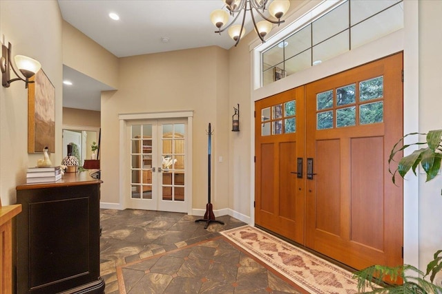 3311 E Chisholm Ln, Spokane, WA 99223 - foyer entrance featuring french doors, a towering ceiling, baseboards, a chandelier, and recessed lighting