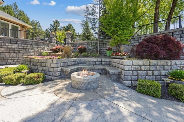 3311 E Chisholm Ln, Spokane, WA 99223 - view of patio featuring a fire pit