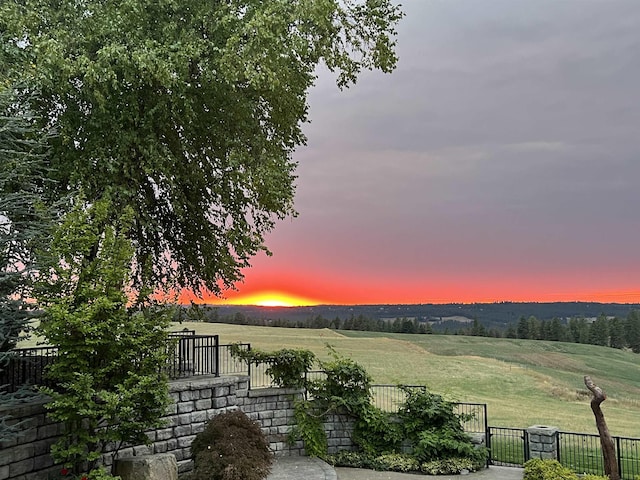 3311 E Chisholm Ln, Spokane, WA 99223 - yard at dusk with a rural view and a gate