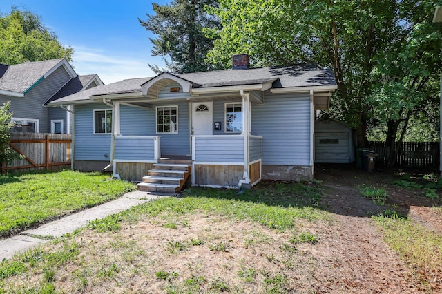 410 E 8th Ave, Spokane, WA 99202 - bungalow-style home featuring a chimney and covered porch