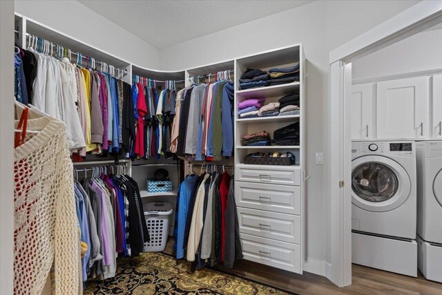 19661 E Riverwalk Ave, Liberty Lake, WA 99016 - spacious closet featuring washer and clothes dryer and wood finished floors