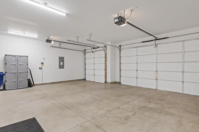 19661 E Riverwalk Ave, Liberty Lake, WA 99016 - garage with a garage door opener and electric panel