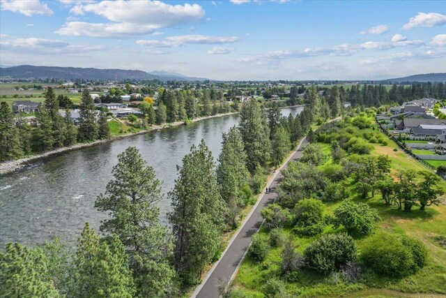 19661 E Riverwalk Ave, Liberty Lake, WA 99016 - aerial view of a water and mountain view