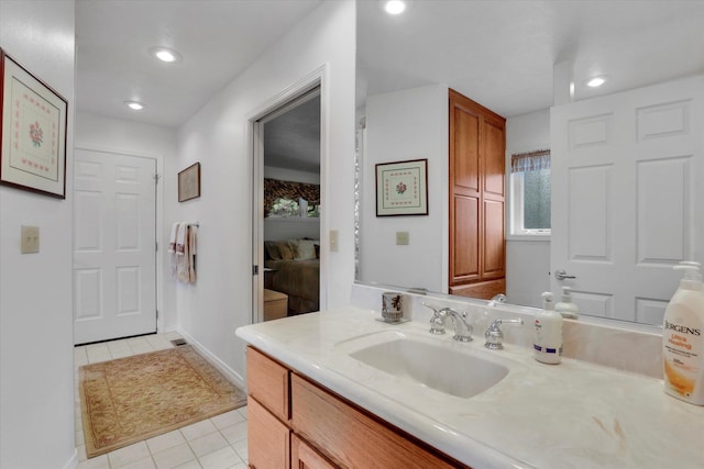252 N Eagle Dr, Chewelah, WA 99109 - bathroom featuring tile patterned floors, vanity, recessed lighting, and baseboards