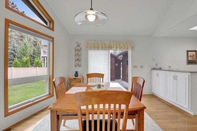 252 N Eagle Dr, Chewelah, WA 99109 - dining room featuring lofted ceiling and light wood-type flooring