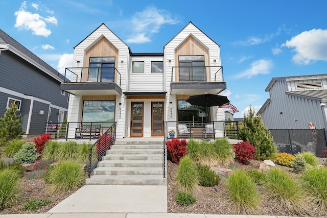 2418 N Atlas Rd, Coeur D Alene, ID 83814 - contemporary home with a balcony and covered porch