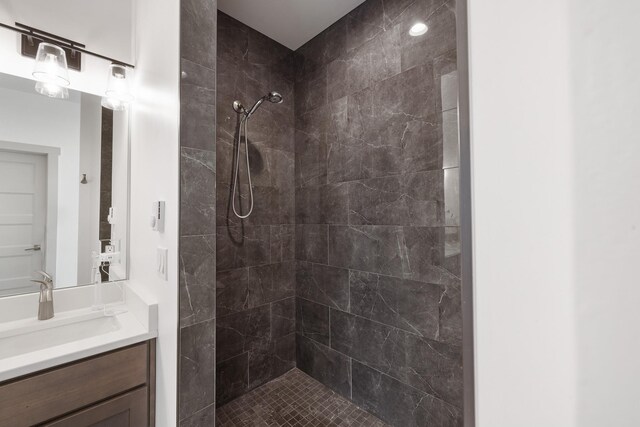 2418 N Atlas Rd, Coeur D Alene, ID 83814 - bathroom featuring a tile shower and vanity