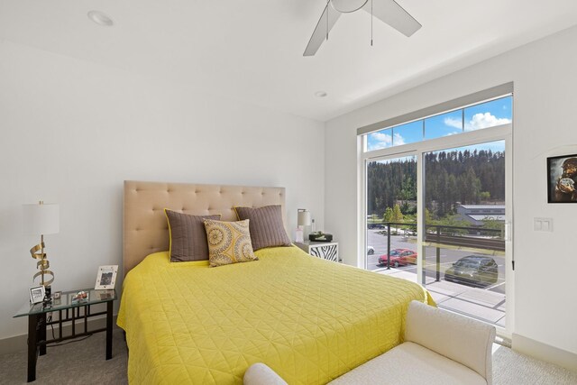 2418 N Atlas Rd, Coeur D Alene, ID 83814 - carpeted bedroom with access to outside, ceiling fan, and baseboards