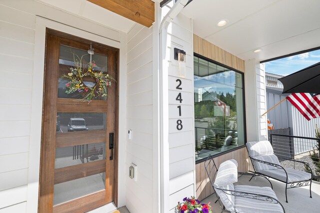 2418 N Atlas Rd, Coeur D Alene, ID 83814 - balcony with a sunroom and a residential view