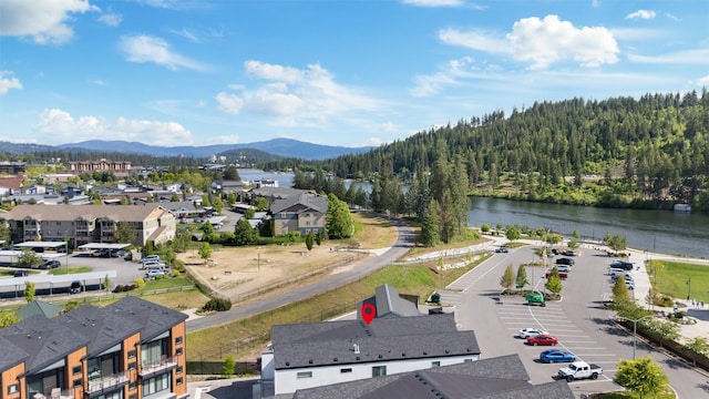 2418 N Atlas Rd, Coeur D Alene, ID 83814 - aerial perspective of suburban area featuring a heavily wooded area and a water and mountain view