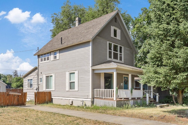 2512 E Rowan Ave, Spokane, WA 99217 - view of front of home with a porch, a chimney, and a shingled roof