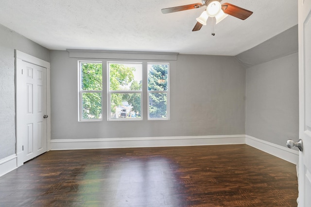 2512 E Rowan Ave, Spokane, WA 99217 - unfurnished bedroom featuring wood finished floors, baseboards, lofted ceiling, ceiling fan, and a textured ceiling