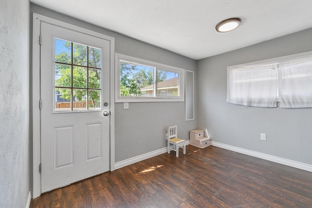 2512 E Rowan Ave, Spokane, WA 99217 - doorway with plenty of natural light, wood finished floors, and baseboards