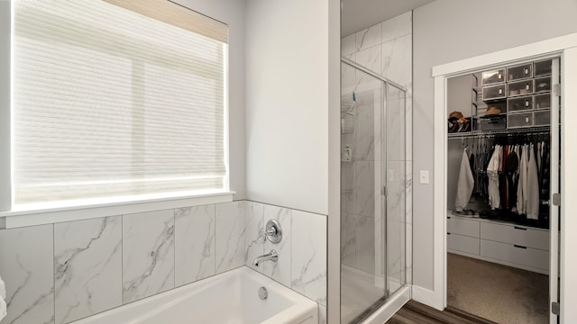 4011 S University Ct, Spokane Valley, WA 99206 - full bath featuring a shower stall, a garden tub, and a walk in closet