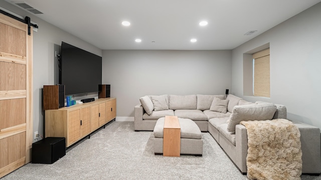4011 S University Ct, Spokane Valley, WA 99206 - living room with light carpet, recessed lighting, a barn door, and baseboards