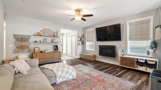 4011 S University Ct, Spokane Valley, WA 99206 - living room with ceiling fan, wood finished floors, a glass covered fireplace, and baseboards