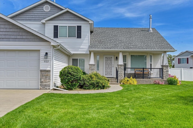 822 N Kelsea St, Medical Lake, WA 99022 - view of front of house with stone siding, covered porch, an attached garage, and a shingled roof