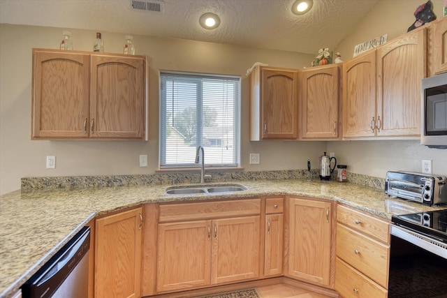 822 N Kelsea St, Medical Lake, WA 99022 - kitchen featuring a sink, stainless steel appliances, recessed lighting, a textured ceiling, and light brown cabinetry